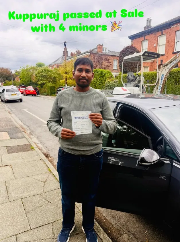 A Learn Local learner holding their driving test pass certificate (photo 5 of 8)