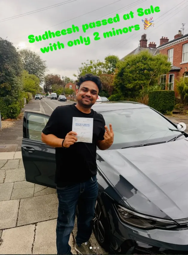 A Learn Local learner holding their driving test pass certificate (photo 4 of 8)